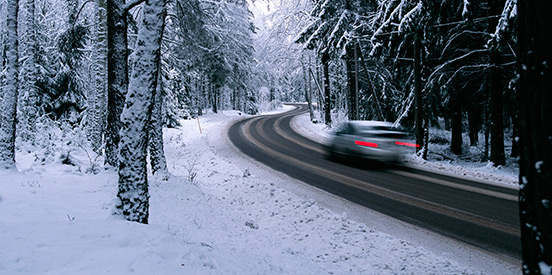 mobil 1 oil car driving cold weather snow ground tress